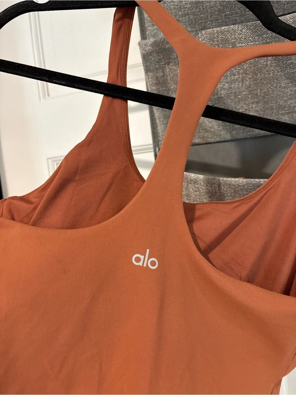 Alo Yoga Sleek Back Bodysuit in Rust Large
